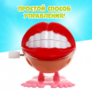 Заводная игрушка ГУБЫ. 